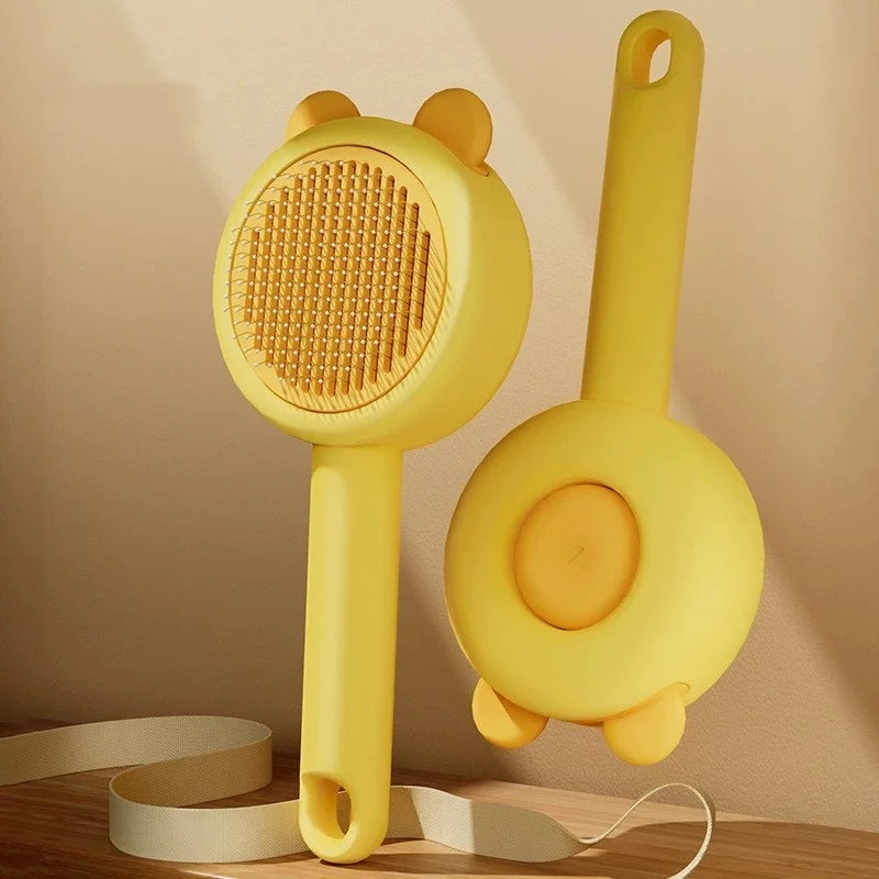 One-Button Self-Cleaning Comb